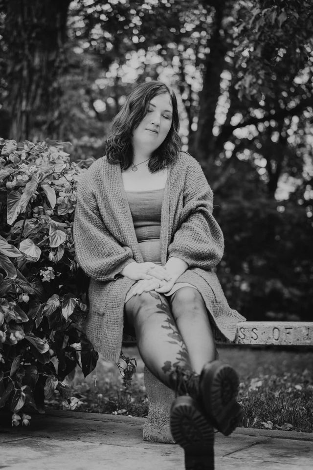 A picture of Karen Hohnstreiter sitting on a bench